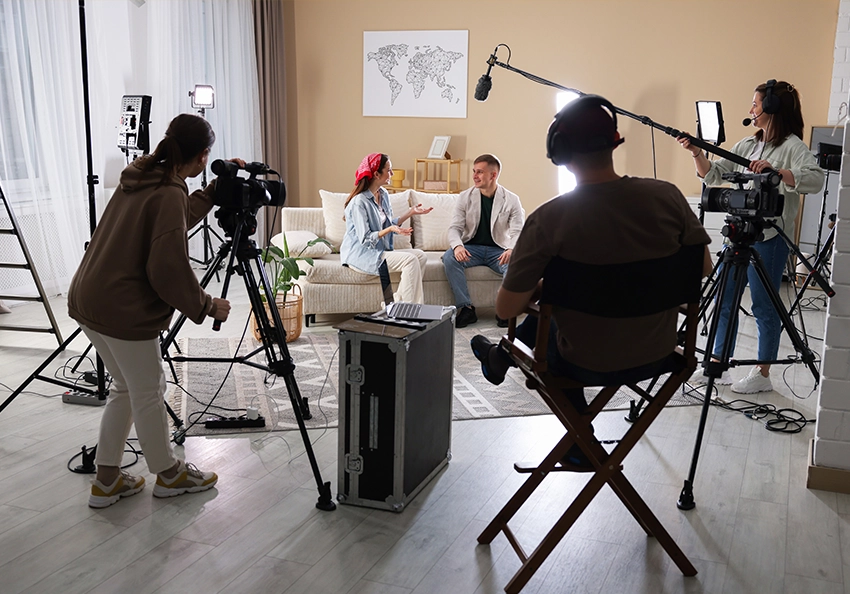 a professional video crew filming an interview