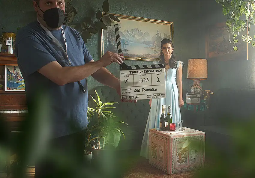 Behind the scenes of a music video shoot with a female singer.