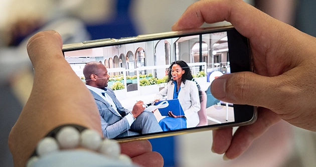 a person holding a phone.